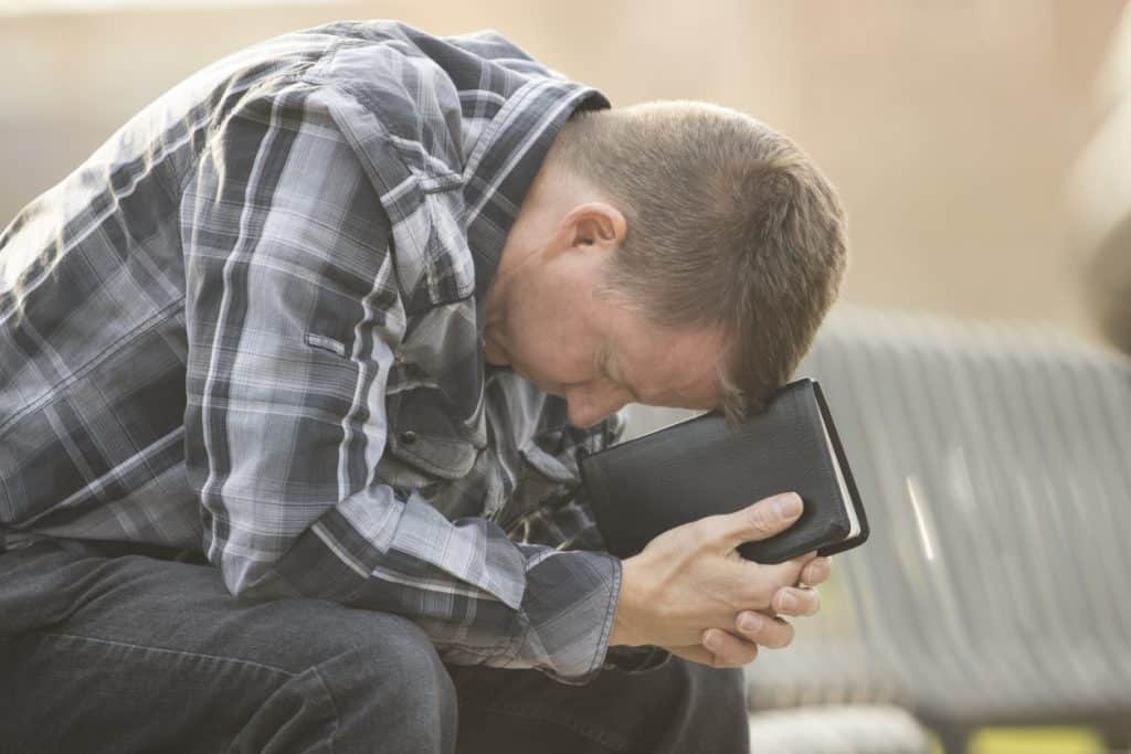Why do I get sleepy when I pray? Man falling asleep during prayer.